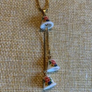 Vintage Sarah Coventry bell necklace with flowers.
